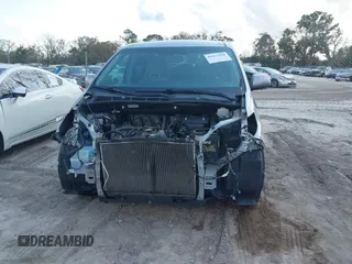 2015 Toyota Sienna LE AAS z VIN 5TDKK3DCXFS653627, wystawiony jako IAAI lot #41477920 z przebiegiem Nie podano mil oraz . Historia ofert i sprzedaży dostępna na DreamBid. Obrazek 13.