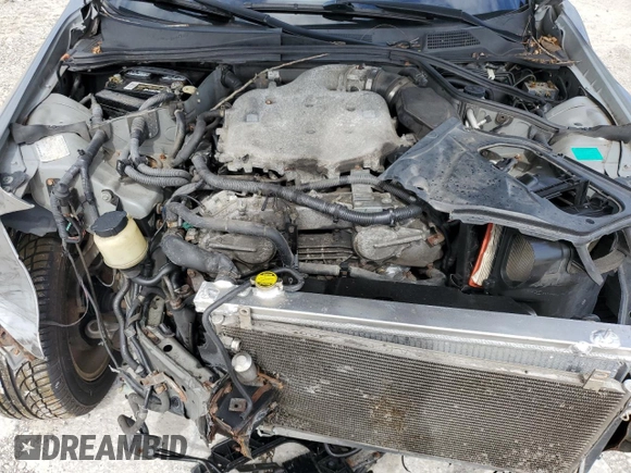 2004 Infiniti G35 w/Leather with VIN JNKCV51F94M717606, listed as a Copart auction lot 74712714 with 197,420 mi miles and Salvage Title. Bid and sale history available at DreamBid. Image 12.