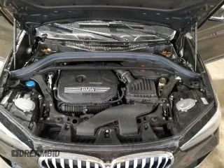 2020 BMW X1 xDrive28i z VIN WBXJG9C09L5P27471, wystawiony jako Copart lot #56573215 z przebiegiem 56 594 mil mil oraz Szkody całkowita. Historia ofert i sprzedaży dostępna na DreamBid. Obrazek 12.