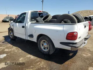 2000 Ford F-150 XL with VIN 1FTZF0727YKA84301, listed as a Copart auction lot 71593544 with 0 mi miles and Salvage Title. Bid and sale history available at carsss.com. Image 2.