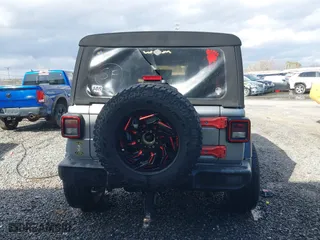 2018 Jeep Wrangler Unlimited Sport S with VIN 1C4HJXDG0JW250952, listed as a IAAI auction lot 41641476 with 117,284 mi miles. Bid and sale history available at carsss.com. Image 16.