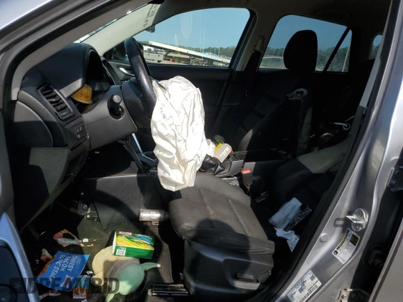 2015 Mazda CX-5 Touring with VIN JM3KE2CY7F0435914, listed as a Copart auction lot 61885704 with 0 mi miles and Salvage Title. Bid and sale history available at carsss.com. Image 7.