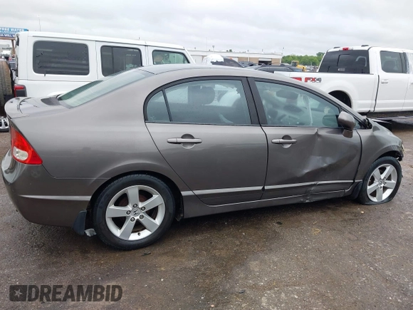 2010 Honda Civic LX-S z VIN 19XFA1F60AE070633, wystawiony jako IAAI lot #42205266 z przebiegiem 217 467 mil mil oraz . Historia ofert i sprzedaży dostępna na DreamBid. Obrazek 14.