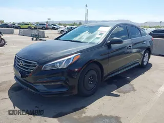2015 Hyundai Sonata Sport with VIN 5NPE34ABXFH084893, listed as a IAAI auction lot 42066253 with 122,923 mi miles and . Bid and sale history available at carsss.com. Image 2.