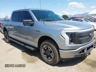 2023 Ford F-150 Lightning Pro z VIN 1FTVW1ELXPWG36980, wystawiony jako IAAI lot #41969530 z przebiegiem 19 755 mil mil oraz . Historia ofert i sprzedaży dostępna na DreamBid. Obrazek 1.