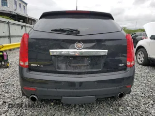 2014 Cadillac SRX Performance Collection with VIN 3GYFNFE33ES687941, listed as a Copart auction lot 57726675 with 164,059 mi miles and Clean title. Bid and sale history available at DreamBid. Image 6.