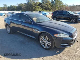 2013 Jaguar XJ with VIN SAJWA2G16DLV50973, listed as a Copart auction lot 82555074 with 148,956 mi miles and Salvage Title. Bid and sale history available at carsss.com. Image 4.