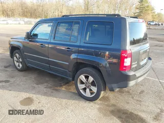 2014 Jeep Patriot Latitude with VIN 1C4NJRFB4ED720241, listed as a IAAI auction lot 40914199 with 128,218 mi miles. Bid and sale history available at carsss.com. Image 3.