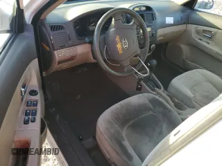 2009 Kia Spectra EX with VIN KNAFE221195630944, listed as a Copart auction lot 42291345 with 83,269 mi miles and Salvage Title. Bid and sale history available at DreamBid. Image 8.