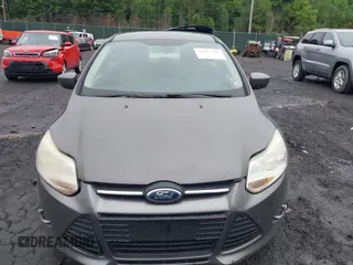 2012 Ford Focus SE z VIN 1FAHP3F29CL442731, wystawiony jako IAAI lot #42517796 z przebiegiem 148 728 mil mil oraz . Historia ofert i sprzedaży dostępna na DreamBid. Obrazek 12.