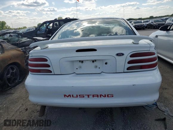 1995 Ford Mustang z VIN 1FALP4043SF252513, wystawiony jako Copart lot #52131605 z przebiegiem 237 066 mil mil oraz Szkoda całkowita • Salvage title. Historia ofert i sprzedaży dostępna na DreamBid. Obrazek 6.