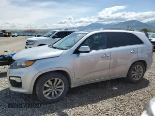 2012 Kia Sorento SX with VIN 5XYKWDA2XCG277266, listed as a Copart auction lot 55707245 with 90,891 mi miles and Salvage title. Bid and sale history available at DreamBid. Image 1.