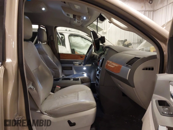 2010 Chrysler Town & Country Limited with VIN 2A4RR7DX5AR386462, listed as a IAAI auction lot 41781713 with 183,091 mi miles and . Bid and sale history available at carsss.com. Image 5.