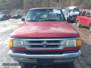 1997 Ford Ranger XLT with VIN 1FTCR15X6VTA06910, listed as a IAAI auction lot 41607892 with 153,956 mi miles. Bid and sale history available at carsss.com. Image 6.