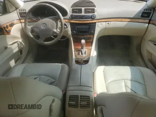 2003 Mercedes-Benz E-Class 3.2L with VIN WDBUF65JX3A313638, listed as a Copart auction lot 70869194 with 142,524 mi miles and Salvage Title. Bid and sale history available at carsss.com. Image 8.