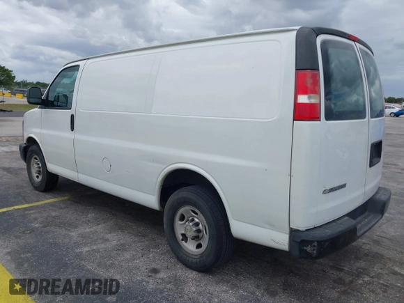 2014 Chevrolet Express Cargo Van with VIN 1GCWGFFA2E1111014, listed as a IAAI auction lot 42190194 with 97,172 mi miles. Bid and sale history available at carsss.com. Image 3.