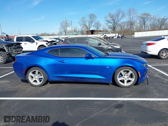 2017 Chevrolet Camaro 1LT z VIN 1G1FB1RX5H0103123, wystawiony jako IAAI lot #41801944 z przebiegiem 179 495 mil mil oraz . Historia ofert i sprzedaży dostępna na DreamBid. Obrazek 13.