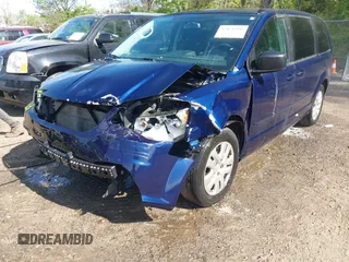 2016 Dodge Grand Caravan SE with VIN 2C4RDGBG2GR146897, listed as a IAAI auction lot 42076396 with 180,603 mi miles and . Bid and sale history available at DreamBid. Image 6.