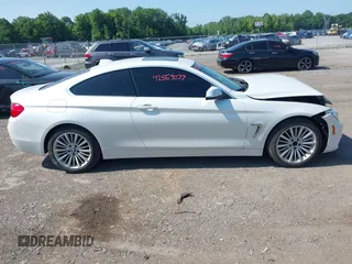 2015 BMW 4 Series 428i xDrive with VIN WBA3N5C52FK484864, listed as a IAAI auction lot 42569077 with 95,431 mi miles and . Bid and sale history available at DreamBid. Image 13.