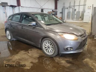 2014 Ford Focus Titanium z VIN 1FADP3N27EL462950, wystawiony jako Copart lot #65207155 z przebiegiem 34 058 mil mil oraz Szkoda całkowita • Salvage title. Historia ofert i sprzedaży dostępna na DreamBid. Obrazek 4.