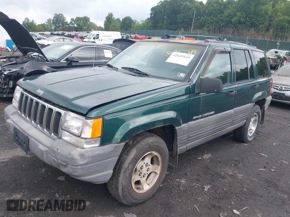 1996 Jeep Grand Cherokee with VIN 1J4EZ58Y7TC128302, listed as a IAAI auction lot 42643449 with 282,036 mi miles and . Bid and sale history available at DreamBid. Image 2.