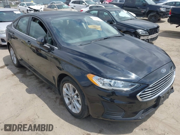 2020 Ford Fusion SE z VIN 3FA6P0LU7LR170922, wystawiony jako IAAI lot #42121025 z przebiegiem 115 799 mil mil oraz . Historia ofert i sprzedaży dostępna na DreamBid. Obrazek 1.