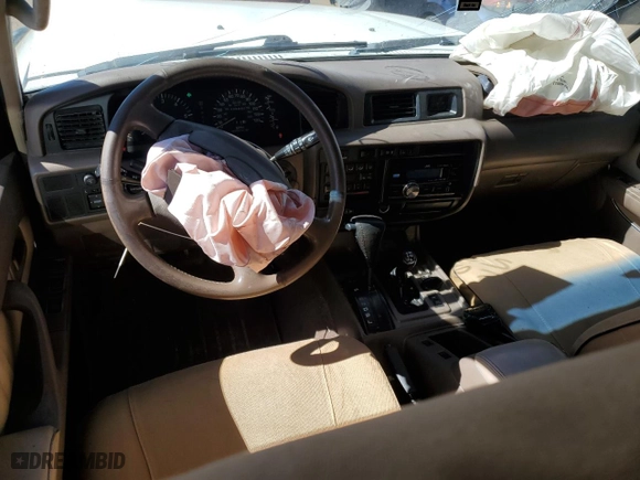 1997 Toyota Land Cruiser with VIN JT3HJ85J2V0180979, listed as a Copart auction lot 73216714 with 239,444 mi miles and Salvage Title. Bid and sale history available at carsss.com. Image 8.