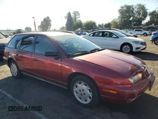 1997 Saturn SW z VIN 1G8ZK8272VZ371975, wystawiony jako Copart lot #75880424 z przebiegiem 121 194 mil mil oraz Szkody całkowita. Historia ofert i sprzedaży dostępna na DreamBid. Obrazek 4.