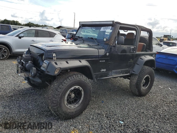 2004 Jeep Wrangler Rubicon with VIN 1J4FA69S54P769356, listed as a Copart auction lot 74089914 with 0 mi miles and Salvage Title. Bid and sale history available at carsss.com. Image 1.