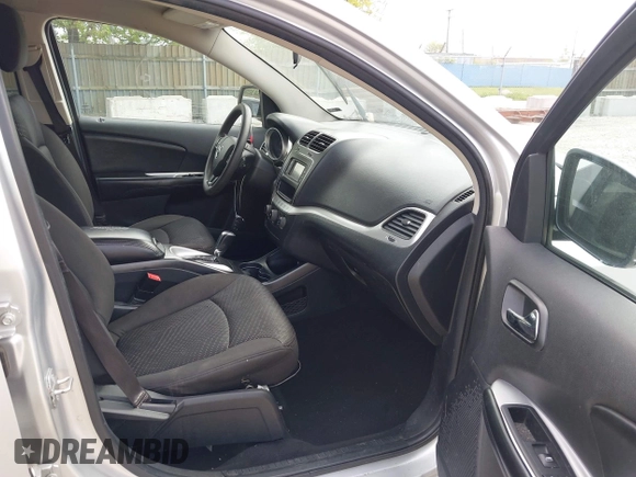 2014 Dodge Journey SXT with VIN 3C4PDCBG9ET209357, listed as a IAAI auction lot 42257467 with 121,786 mi miles and . Bid and sale history available at DreamBid. Image 5.