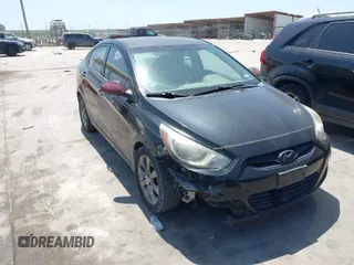 2012 Hyundai Accent GLS with VIN KMHCU4AE1CU057819, listed as a IAAI auction lot 42010539 with 170,454 mi miles. Bid and sale history available at carsss.com. Image 1.