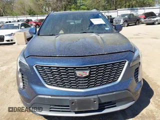 2019 Cadillac XT4 FWD Premium Luxury z VIN 1GYFZCR47KF109394, wystawiony jako IAAI lot #41864606 z przebiegiem 98 425 mil mil oraz . Historia ofert i sprzedaży dostępna na DreamBid. Obrazek 12.