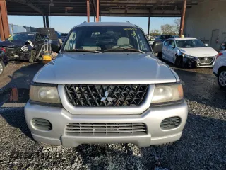 2003 Mitsubishi Montero ES z VIN JA4LS21H13J005577, wystawiony jako Copart lot #41415375 z przebiegiem 171 037 mil mil oraz Szkoda całkowita • Salvage title. Historia ofert i sprzedaży dostępna na DreamBid. Obrazek 5.