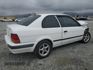 1996 Toyota Tercel DX z VIN JT2AC52L5T0145290, wystawiony jako Copart lot #45027855 z przebiegiem 186 673 mil mil oraz Szkoda całkowita • Salvage title. Historia ofert i sprzedaży dostępna na DreamBid. Obrazek 3.