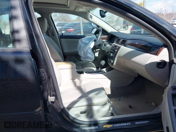 2012 Chevrolet Impala LTZ with VIN 2G1WC5E38C1185191, listed as a IAAI auction lot 41877040 with 99,315 mi miles and . Bid and sale history available at DreamBid. Image 5.