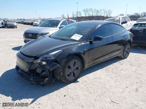 2022 Tesla Model 3 Long Range with VIN 5YJ3E1EB2NF174028, listed as a IAAI auction lot 41697310 with NaN miles. Bid and sale history available at carsss.com. Image 2.