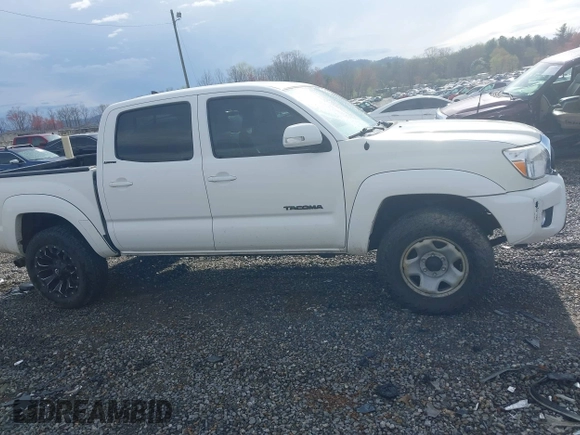 2015 Toyota Tacoma with VIN 3TMLU4EN5FM188601, listed as a IAAI auction lot 41883555 with 143,904 mi miles and . Bid and sale history available at DreamBid. Image 14.