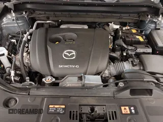 2021 Mazda CX-5 Touring with VIN JM3KFBCM5M0394707, listed as a IAAI auction lot 41887973 with 44,670 mi miles. Bid and sale history available at carsss.com. Image 10.