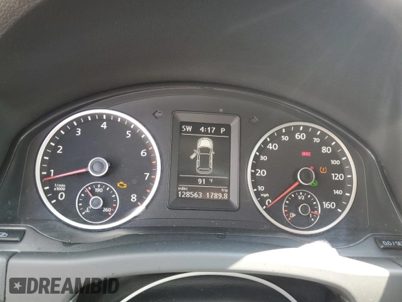 2010 Volkswagen Tiguan Wolfsburg Edition with VIN WVGAV7AX4AW003410, listed as a Copart auction lot 60645845 with 128,563 mi miles and Salvage title. Bid and sale history available at DreamBid. Image 9.