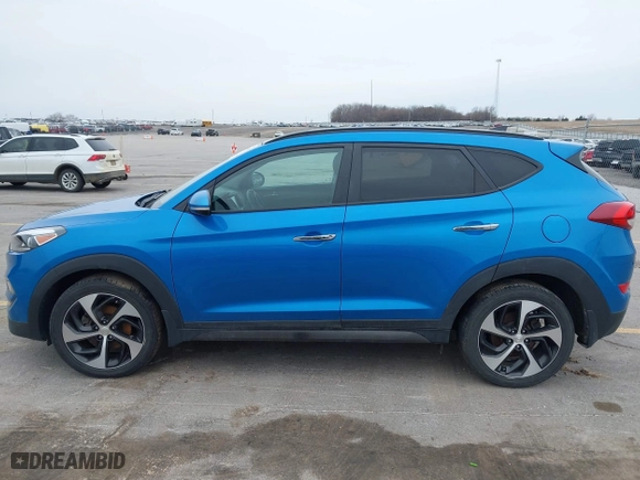 2016 Hyundai Tucson Eco with VIN KM8J3CA28GU041357, listed as a IAAI auction lot 41661997 with 87,000 mi miles. Bid and sale history available at carsss.com. Image 14.