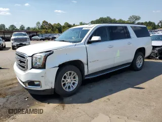 2019 GMC Yukon XL SLT with VIN 1GKS1GKCXKR239712, listed as a Copart auction lot 74721584 with 143,690 mi miles and Salvage Title. Bid and sale history available at carsss.com. Image 1.