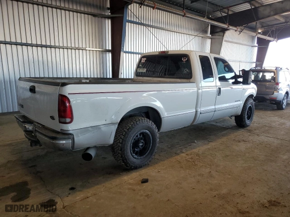 1999 Ford Super Duty F-250 XL with VIN 1FTNX20F0XEE02454, listed as a Copart auction lot 84049154 with 227,005 mi miles and Salvage Title. Bid and sale history available at carsss.com. Image 3.