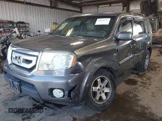 2010 Honda Pilot Touring with VIN 5FNYF4H89AB026005, listed as a IAAI auction lot 42118607 with 182,689 mi miles. Bid and sale history available at carsss.com. Image 2.