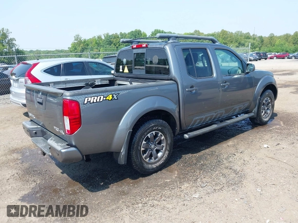 2016 Nissan Frontier Pro-4X with VIN 1N6AD0EVXGN765434, listed as a IAAI auction lot 42485545 with 109,331 mi miles and . Bid and sale history available at DreamBid. Image 4.