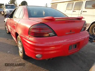 2001 Pontiac Grand Am SE1 with VIN 1G2NF52T91M570800, listed as a IAAI auction lot 41307660 with 180,401 mi miles. Bid and sale history available at carsss.com. Image 3.