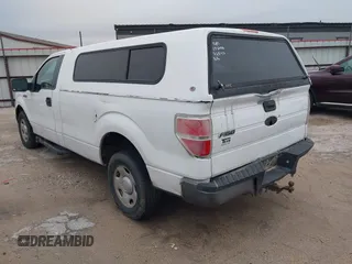 2009 Ford F-150 XL with VIN 1FTRF12839KA68521, listed as a IAAI auction lot 41307002 with 191,999 mi miles. Bid and sale history available at carsss.com. Image 3.