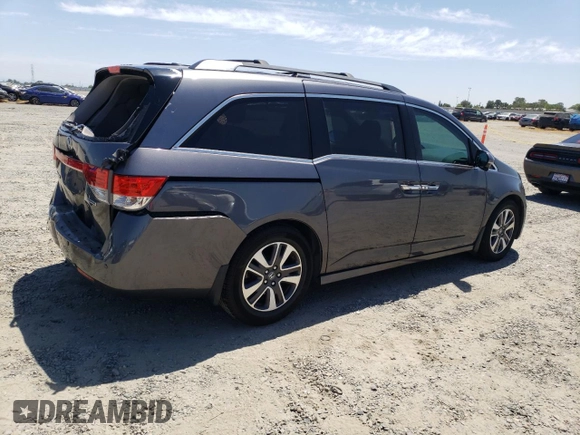 2014 Honda Odyssey Touring с VIN 5FNRL5H92EB116923, выставлен на аукционе Copart как лот 58060645 с пробегом 106 285 миль миль и Списание • Salvage title. История ставок и продаж доступна на DreamBid. Изображение 3.