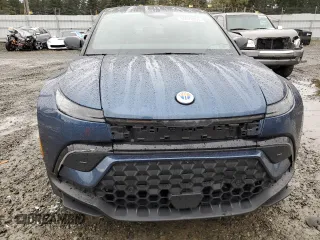 2023 Fisker Ocean One z VIN VCF1ZBU2XPG003443, wystawiony jako Copart lot #50072055 z przebiegiem 7805 mil mil oraz Szkody całkowita. Historia ofert i sprzedaży dostępna na DreamBid. Obrazek 5.