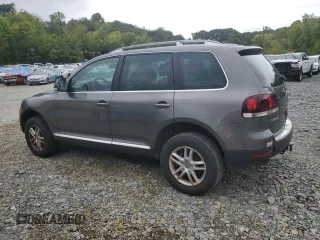 2010 Volkswagen Touareg VR6 with VIN WVGBF7A91AD001497, listed as a Copart auction lot 68234794 with 173,826 mi miles and Clean Title. Bid and sale history available at DreamBid. Image 2.