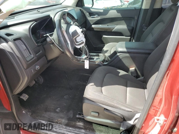 2015 GMC Canyon 2WD SLE with VIN 1GTG5BE32F1233430, listed as a Copart auction lot 47898925 with 59,149 mi miles and Salvage Title. Bid and sale history available at DreamBid. Image 7.